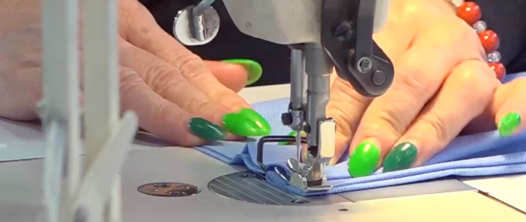Person sewing a face mask